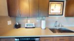 Stylish granite counters and stainless steel sink